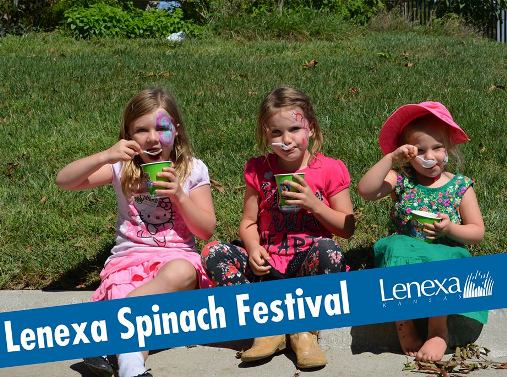 Lenexa Spinach Festival - three young girls sitting in the grass eating snacks