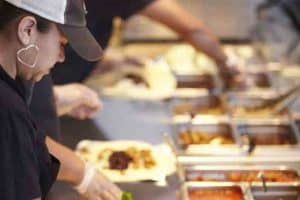 Free food delivery in Kansas City - Chiptole workers making food