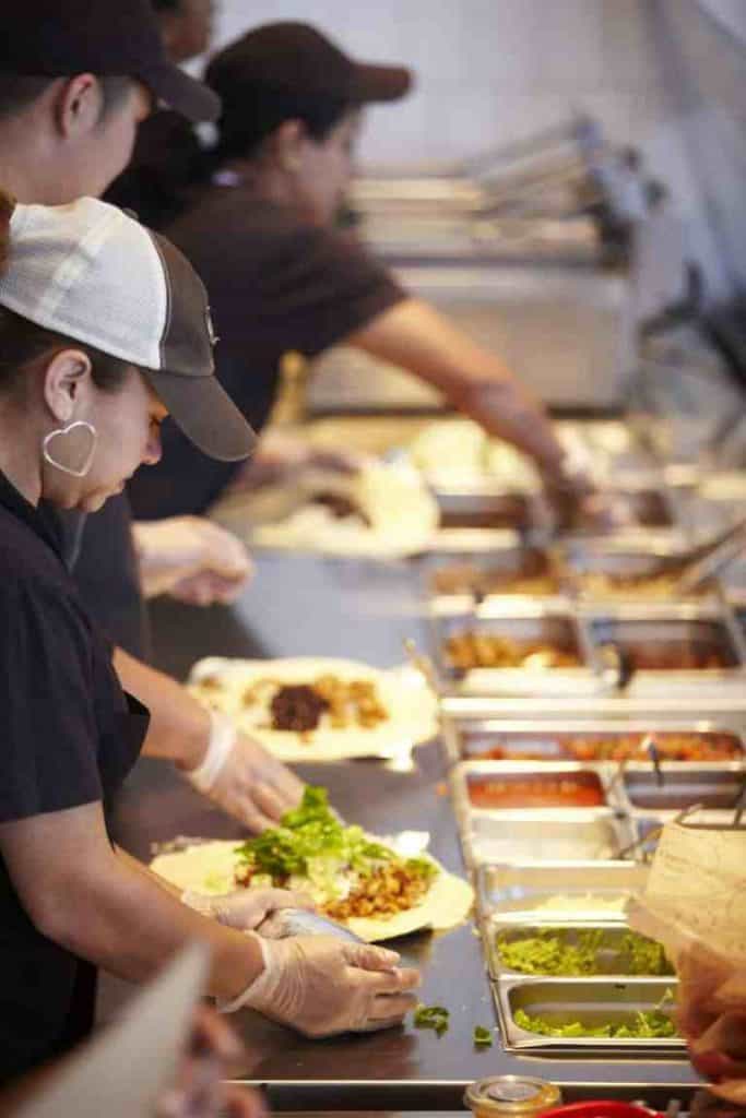 Free food delivery in Kansas City - Chipotle workers making food