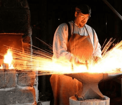 Westport Lost Arts Fair - man doing blacksmith work