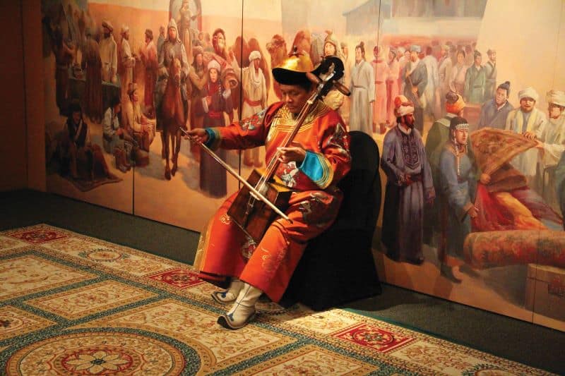 Genghis Khan exhibit at Union Station Kansas City - traditional Mongolian musician playing an instrument