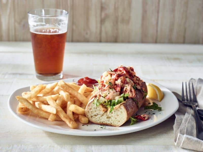 Kansas City Restaurant Deals - Plate of lobster roll with fries and a glass of beer