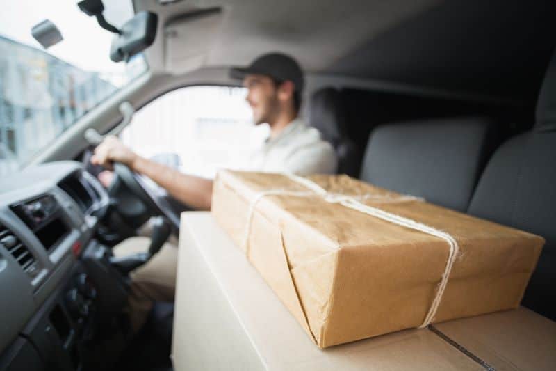 Amazon prime membership discount for Veterans - delivery driver in van with packages