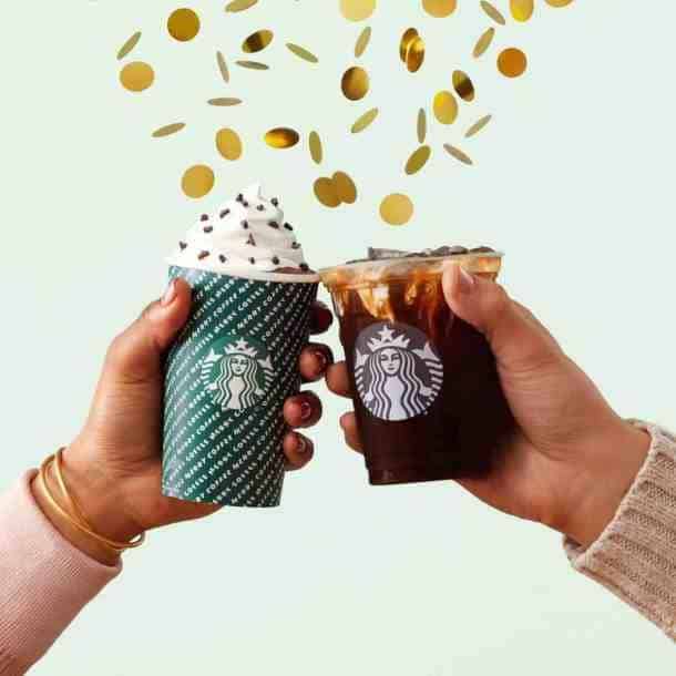 Starbucks pop-up parties in Kansas City - two Starbucks cups toasting