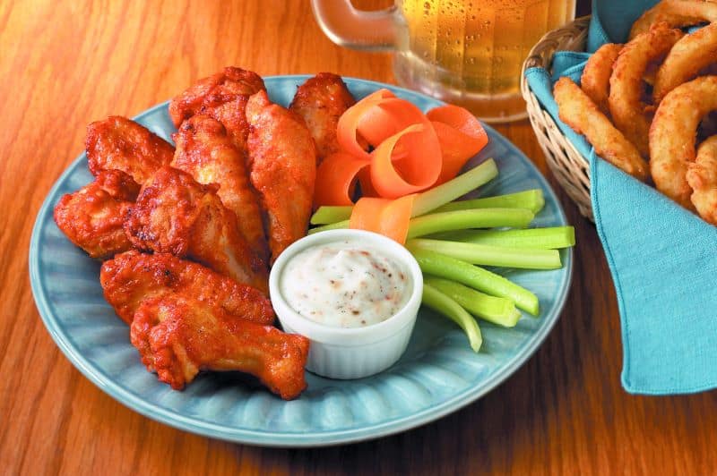 National Chicken Wing Day deals - plate of chicken wings