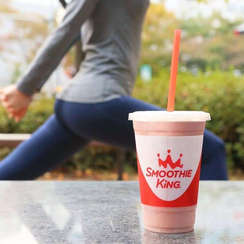 Kansas City restaurant deals - Smoothie King and a woman walking