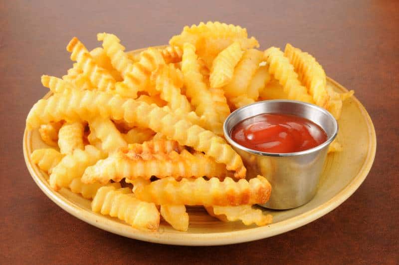 Plate of french fries for National French Fry Day deals in Kansas City