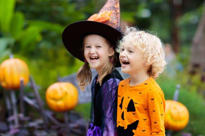 Kids trick or treating in Halloween costume