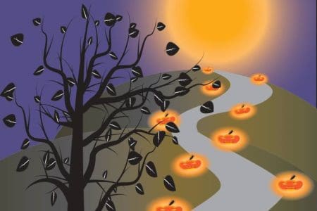 Halloween tree and pumpkins