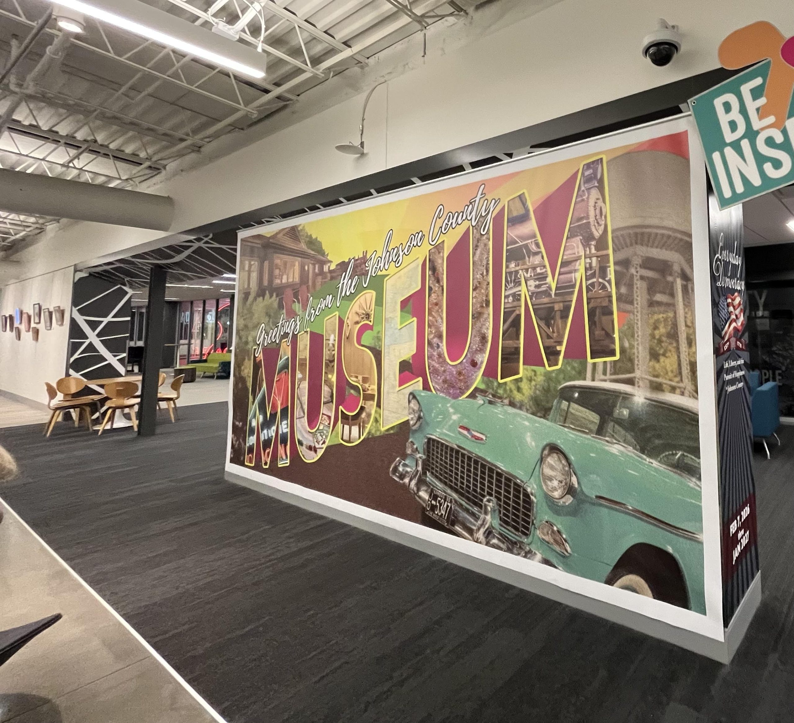 Johnson County Museum Entrance Exhibit Sign with Large Museum Wording and a 50's Style Car