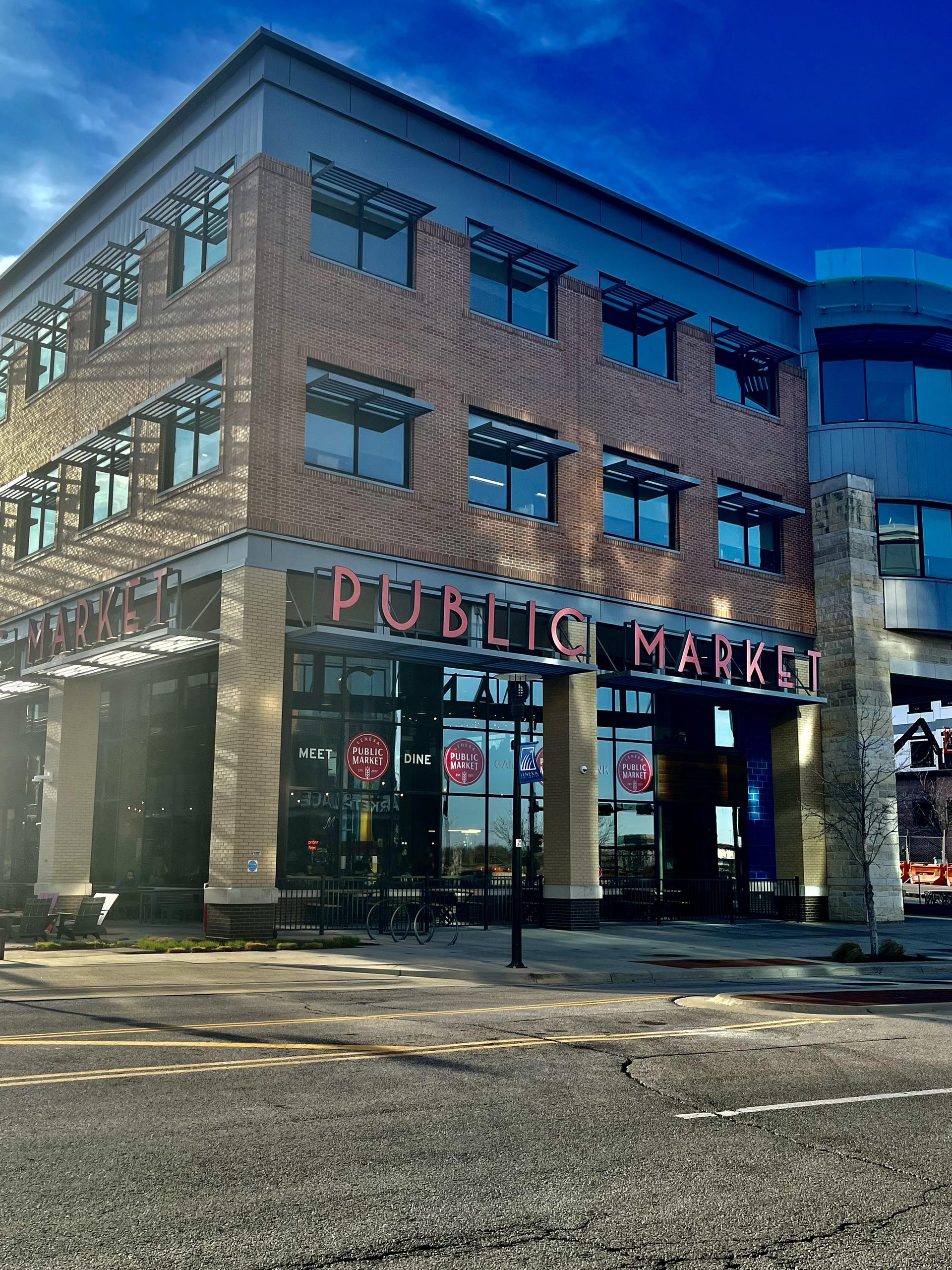 Lenexa Public Market building exterior at Lenexa City Center in Kansas with modern brick architecture